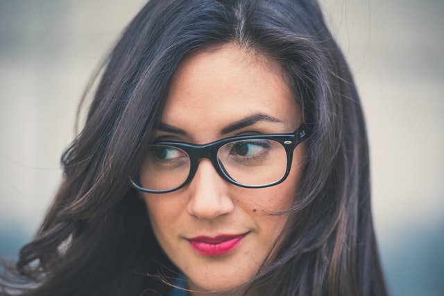 woman wearing prescription glasses
